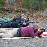 Sergeant Herrera, Officer Vestri, and Officer Smith take aim from a distance.